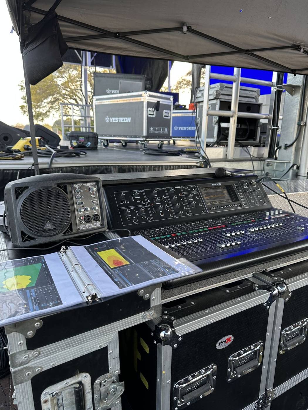 Allen & Heath console at front of house with show paperwork
